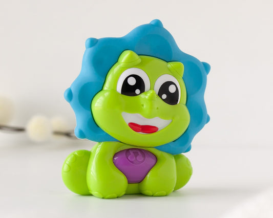 KIOKIDS - Massaggiagengive musicale dinosauro verde e blu